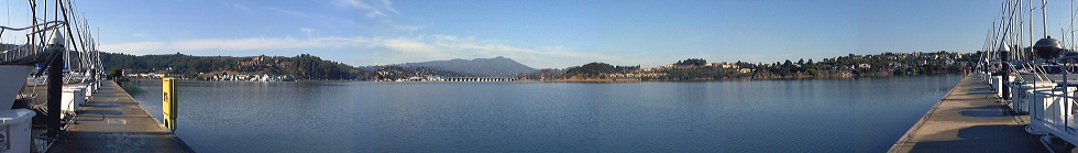Panorama across the water from a sailboat in Sausalito