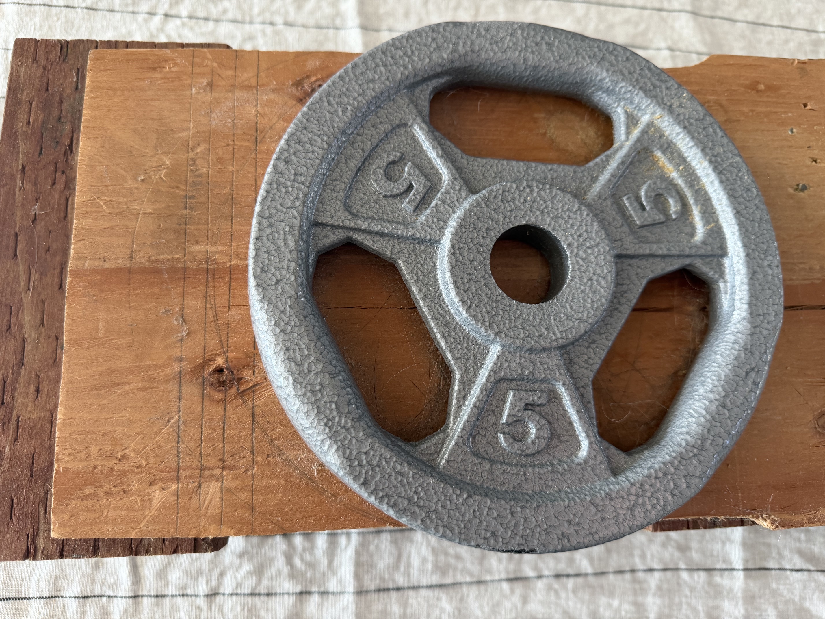 Counterweight testing on the redesigned cat-food restrictor
